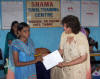 Student receiving diploma