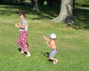 Boy with colors chasing woman