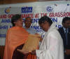 Woman receiving award